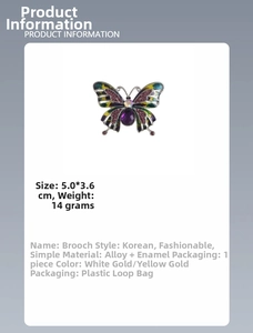 Detailed view of enamel butterfly brooch with purple gemstone inlay and crystal accents