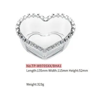 Heart shaped clear glass plate with beaded rim for snacks desserts and jewelry storage