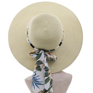 Bohemian wide brim straw sun hat with floral print ribbon and pearl accents for women