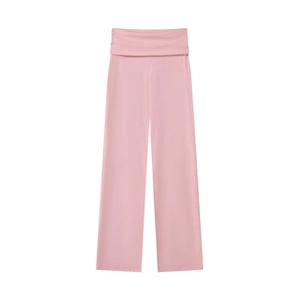 Detail of pink flare modal trousers with lace trim and fold-over high waistband design