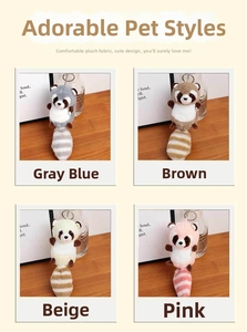 Macro display of cute raccoon plush keychains in grey, brown, beige, and pink colors