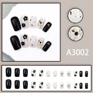 Short square press-on nails with minimalist black and white flower patterns, 24 piece set