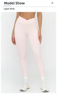 Legging de yoga rose pâle taille haute avec taille croisée et poches latérales