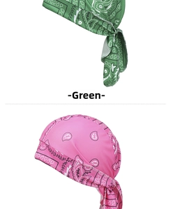 Detail of green and pink paisley bandana caps with stretch fabric and tie-back design
