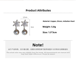 Detail of snowflake pearl earrings showing zircon material and 1.5x3cm dimensions