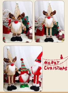 Detail of retractable long legs on Christmas gnome plush with sequin reindeer antlers