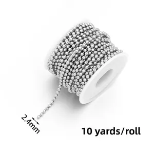 Macro view of 2.4mm silver stainless steel bead chain on a 10-yard spool for DIY jewelry