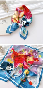 Artistic square scarf detail featuring a cat and floral print with satin finish