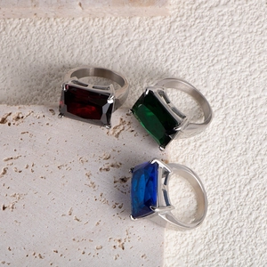 Elegant titanium steel rings with rectangular red green and blue gemstone crystals