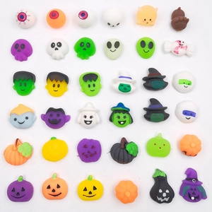 Macro view of 30 Halloween TPR squishy toys including pumpkins, ghosts and skulls