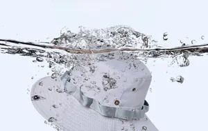 Water splashing on light grey quick-dry sun hat to show colorfastness and durability