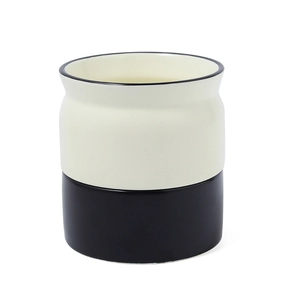 Nordic ceramic utensil holder in cream and black two-tone design for kitchen storage