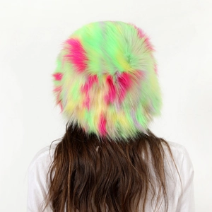 Detail of colorful fuzzy faux fur bucket hat with neon green and pink gradient texture