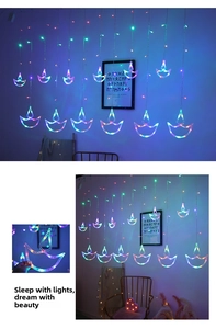 Close-up of colorful LED Diya curtain lights for Diwali festive interior decoration