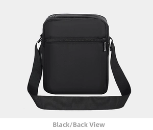 Detailed back view of the black Oxford cloth crossbody bag with a hidden zipper pocket