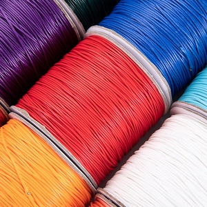 Close-up of assorted colorful 10m waxed cords for DIY jewelry making and weaving