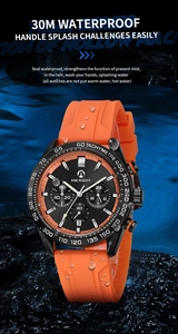 Waterproof sports chronograph watch with orange silicone strap on splashing dark rocks