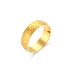 Vintage golden matte ring featuring celestial star and moon embossed patterns