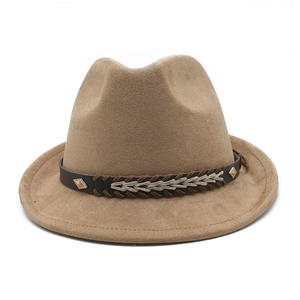 Close-up of camel suede fedora with brown strap, woven cord and metal studs detail