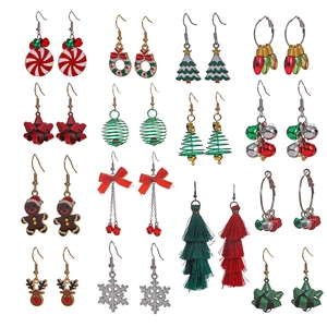 Detailed collection of 16 pairs of Christmas earrings with trees and reindeer