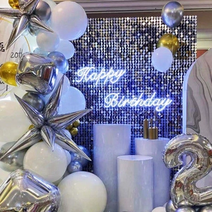 Birthday party decoration set with neon Happy Birthday sign and sequin backdrop wall