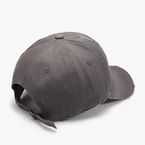 Vintage distressed baseball cap in dark charcoal grey with frayed details and adjustable strap