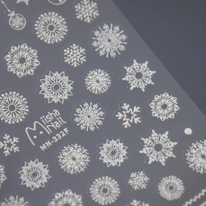 3D relief snowflake nail stickers with embossed texture and matte white finish