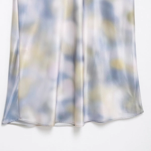 Elegant satin tie-dye maxi skirt in blue and yellow silk fabric with premium drape finish