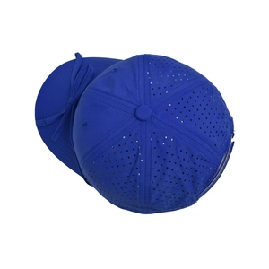 Detail view of quick-dry baseball cap with laser-cut breathability holes and bow ribbon