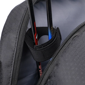 Macro detail of hexagonal honeycomb texture fabric with velcro strap for rod storage