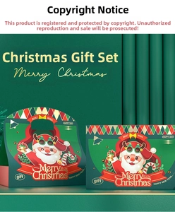 Close-up of Christmas gift boxes with dark green Santa illustrations and thick cardboard texture