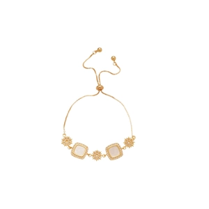 Bracelet élégant plaqué or 18 carats avec nacre carrée et breloques soleil en zircone