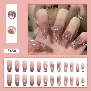 Pink gradient press-on nails with shiny rhinestones and heart-shaped chain design
