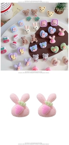 Detailed close-up of cute cartoon plush earrings featuring pink rabbits and teddy bears