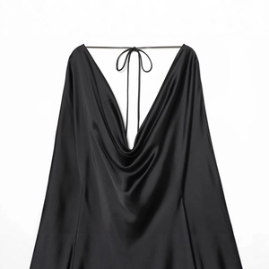 Elegant black satin slip dress with a draped cowl neck and smooth silk texture finish