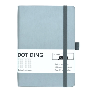 Gray dotted journal A5 with elastic closure band and pen loop detail showing on cover