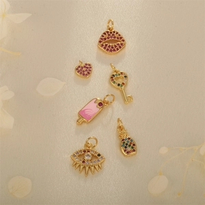 Golden charms collection with colorful zircon inlays for necklaces and bracelets