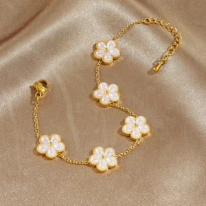 Elegant gold stainless steel chain bracelet featuring five shimmering pearl flower charms