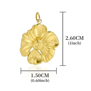 Detailed view of a gold flower pendant with precise size measurements in inches and cm