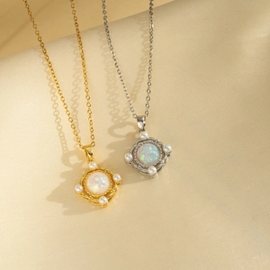 Minimalist titanium steel planet necklaces in gold and silver with opal pendants