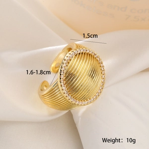 Detail of 18K gold plated wide ring with zircons and adjustable open band design