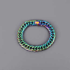 Rainbow stainless steel Cuban link bracelet with secure square buckle in macro detail