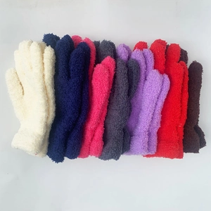 Flat lay view of soft chenille thermal gloves in multiple candy colors on white background