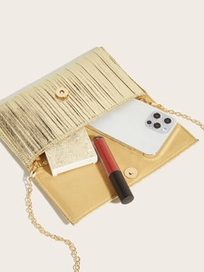 Detail of gold pleated evening clutch showing interior space for phone and makeup