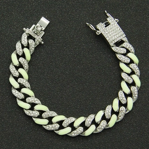 Hiphop silver Cuban link bracelet with iced-out diamonds and luminous green details