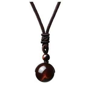 Brown braided rope necklace with round natural tiger eye stone pendant and bead charm