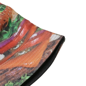 Close-up of burger print details and twill fabric texture on a reversible bucket hat