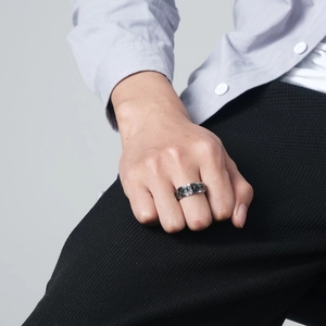 Men's vintage Viking triangle knot spinner ring in silver and black stainless steel
