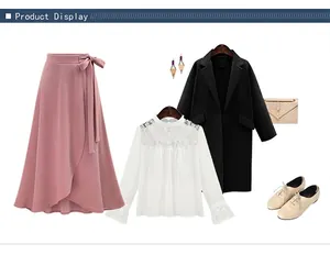 Pink high-waist split skirt and white lace-up shirt with elegant black coat detail