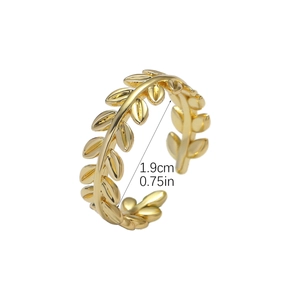 Detailed view of adjustable golden leaf pattern ring with 1.9cm inner diameter measurement
